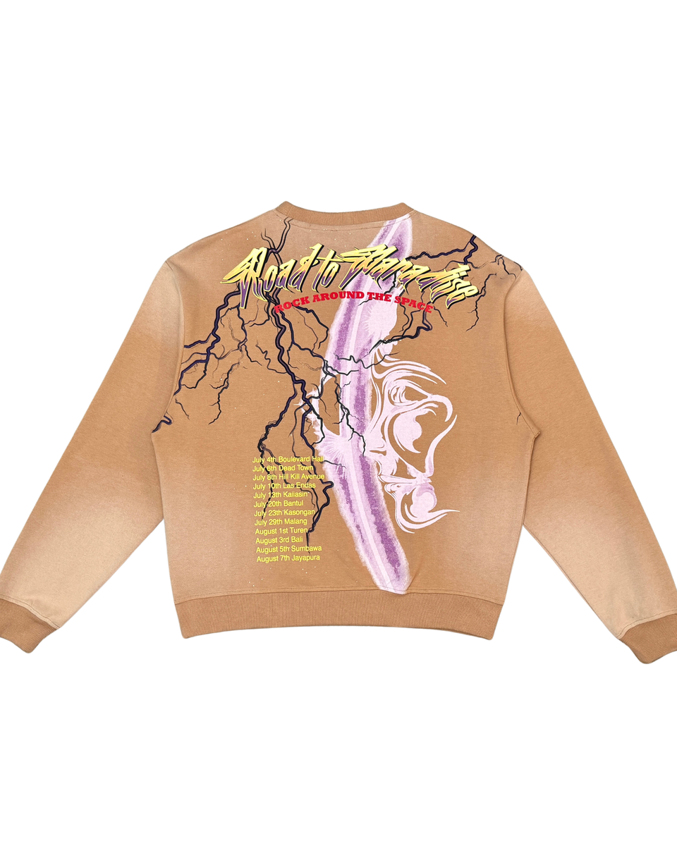 Beige sweatshirt with graphic design on the back against a white background