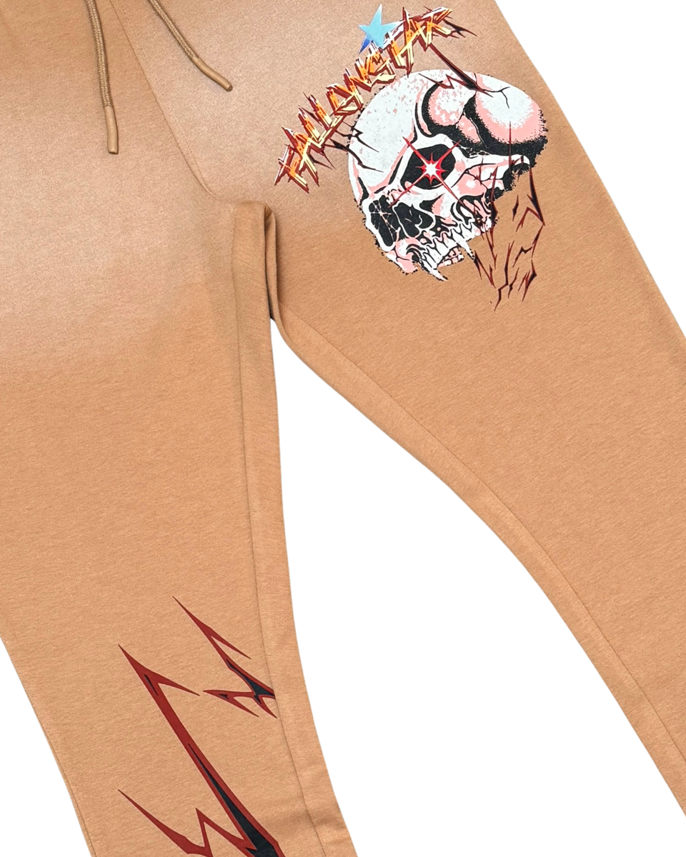 Tan hoodie with a graphic design on the sleeve against a white background