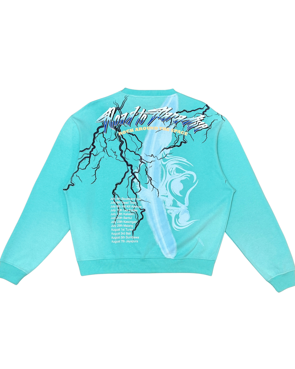 Turquoise sweatshirt with graphic design on the back against a white background