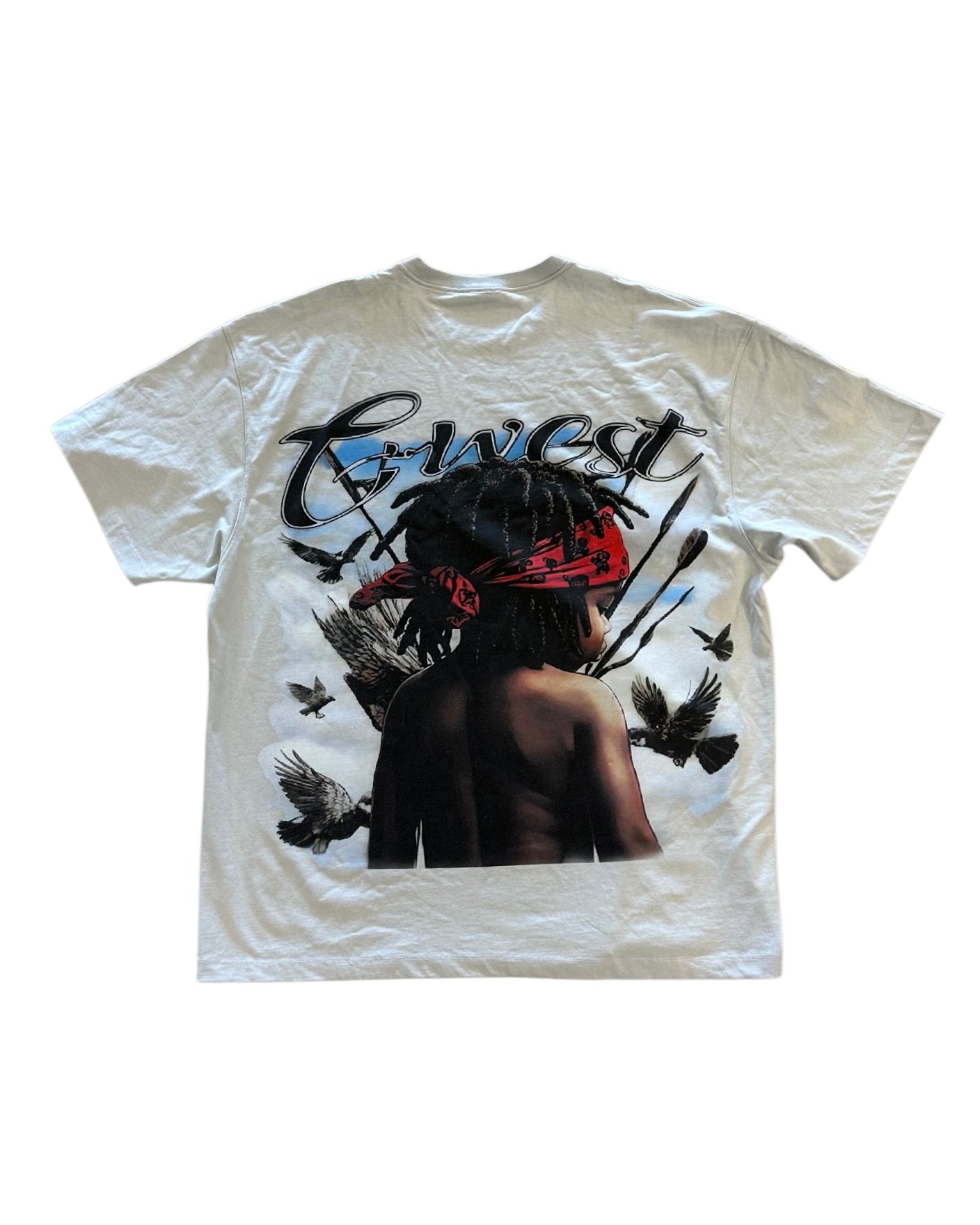 White t-shirt with graphic design of a person with dreadlocks and birds on a white background