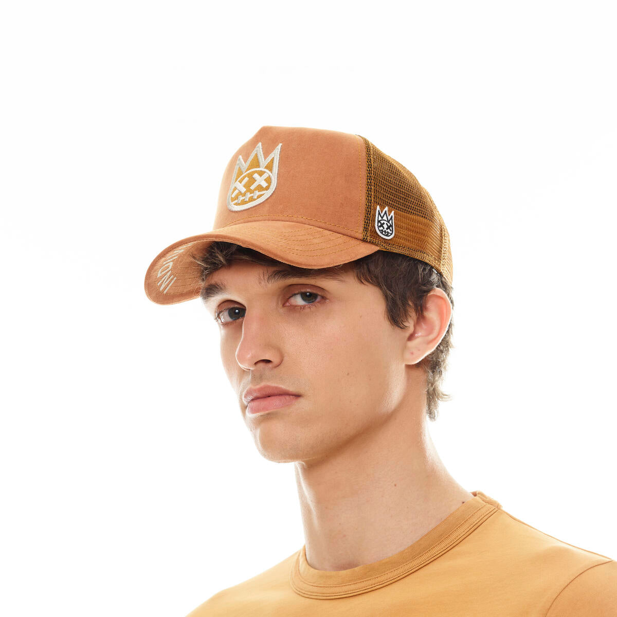 Cult of individuality shimuchan logo trucker hat in a rust color