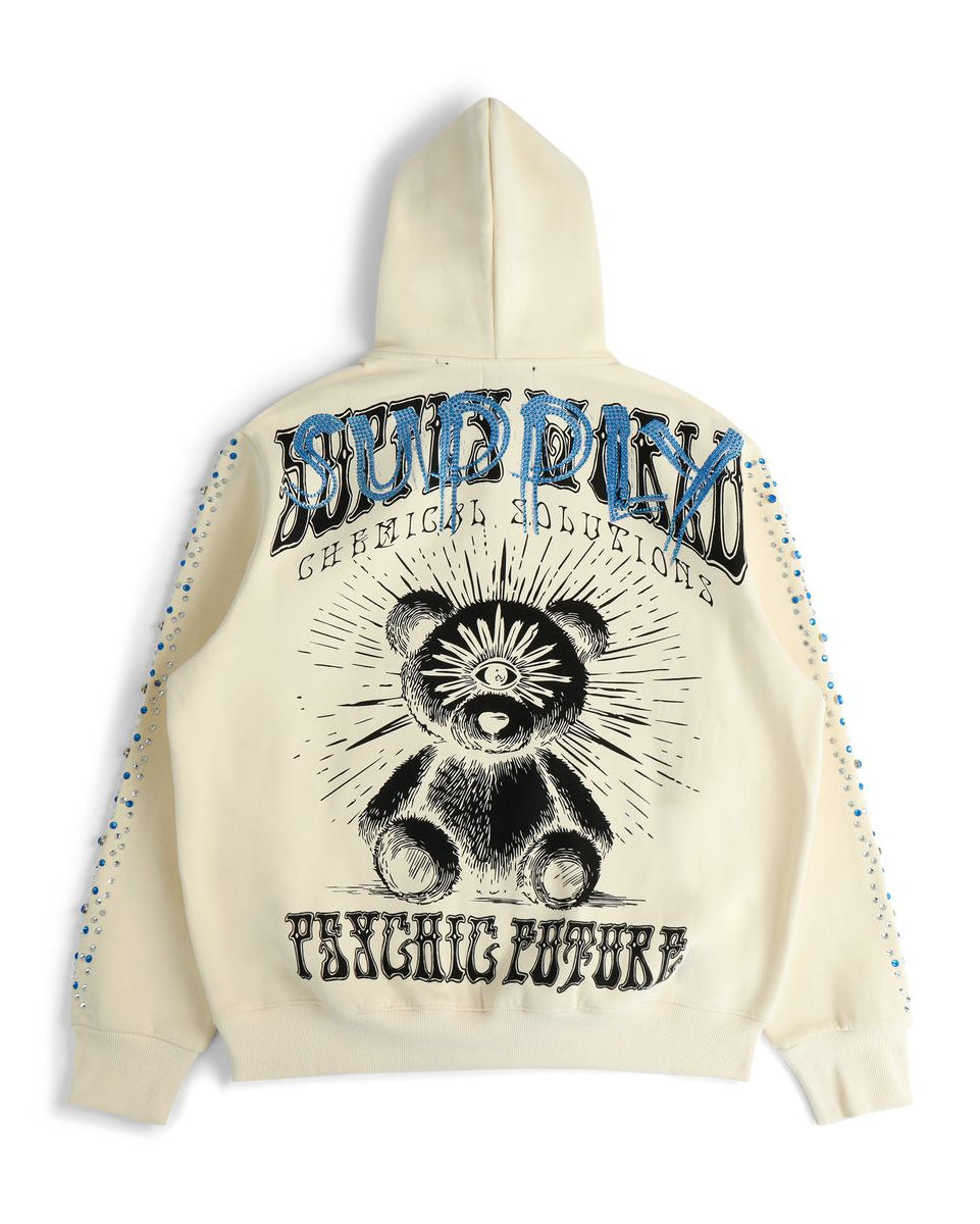 Beige hoodie with graphic design and text on a white background