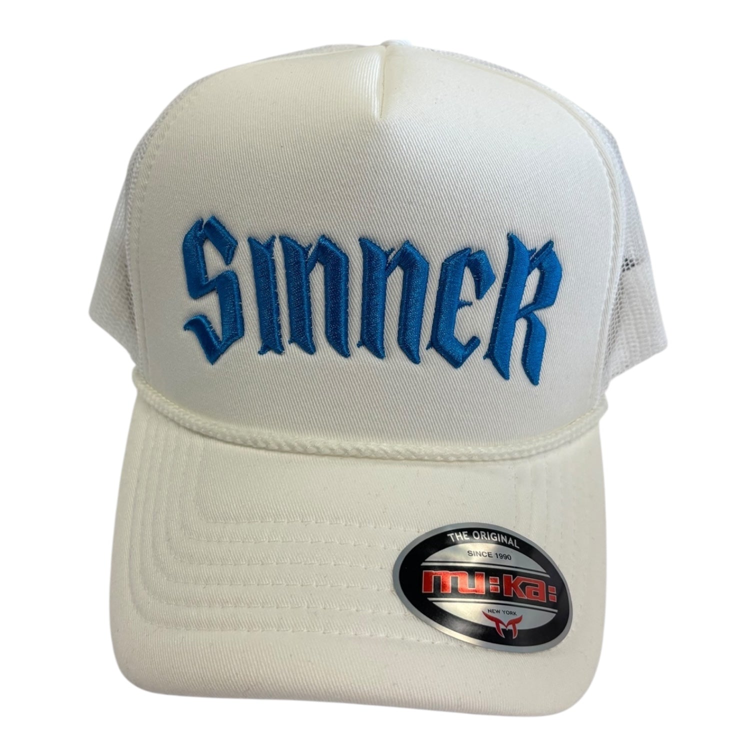 White cap with blue text 'Sinner' and MUKA logo on a white background