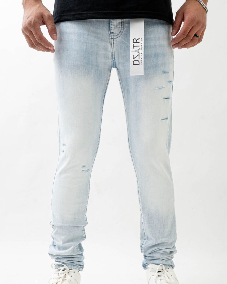 Light blue jeans with a brand label on a white background