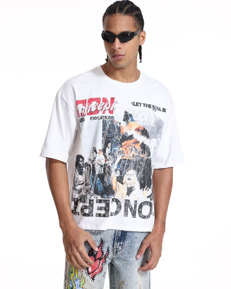 Man wearing a graphic t-shirt with colorful design on a white background