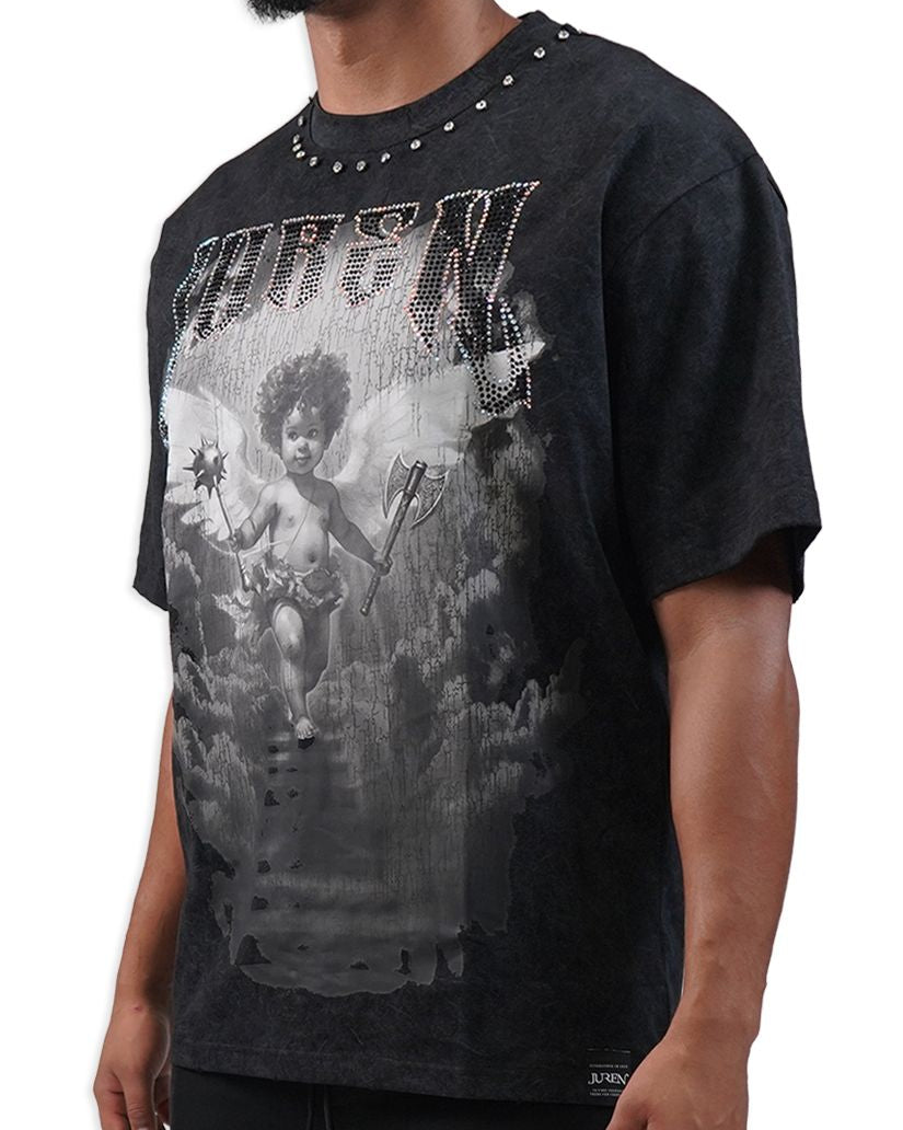 Person wearing a black graphic t-shirt with a design on a white background