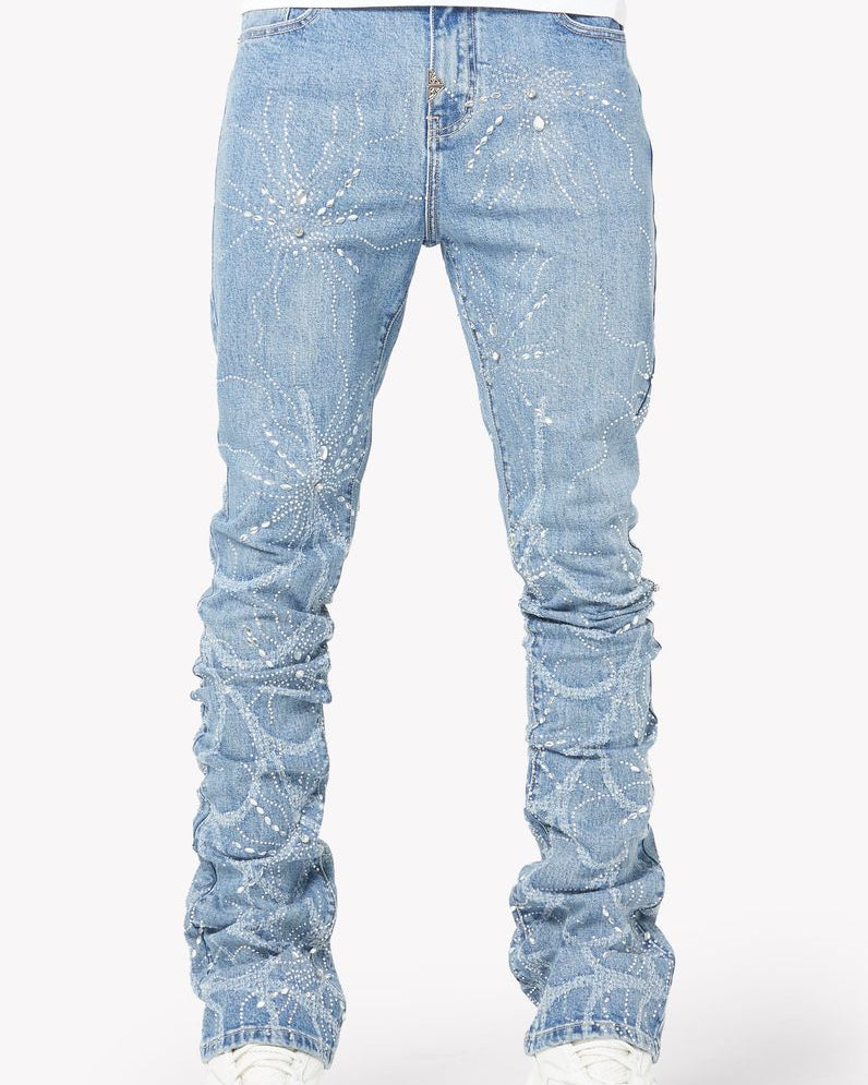 Light blue distressed jeans on a white background