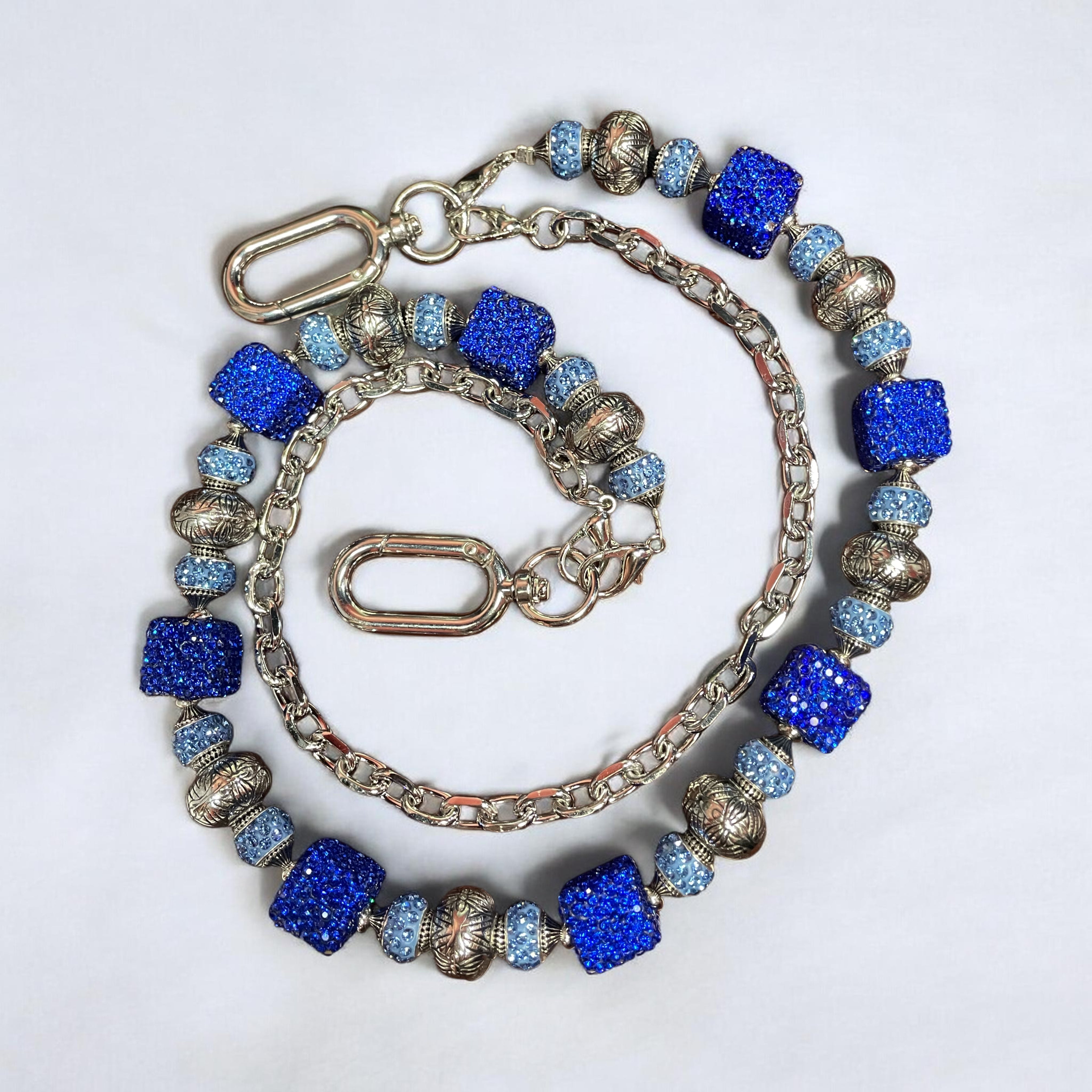 wallet chain with blue and silver beads on a white background