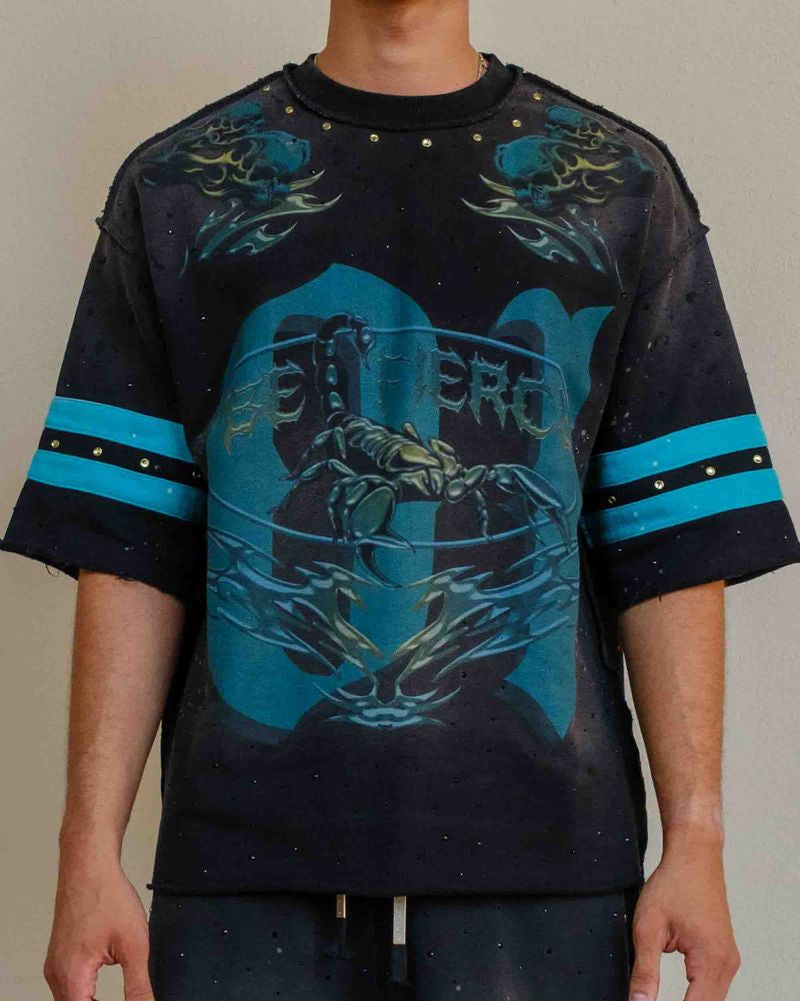 Person wearing a black and blue sports outfit with 'Fierce' branding on a plain background