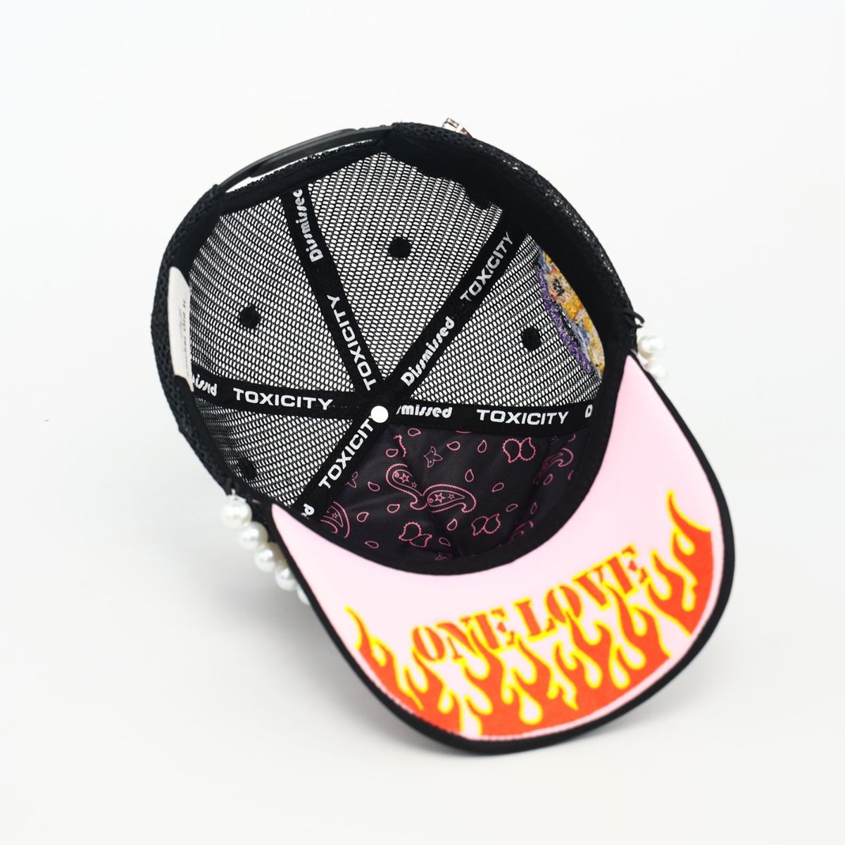 Trouble in Paradise Trucker Hat