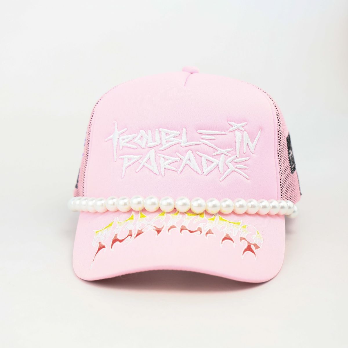 Trouble in Paradise Trucker Hat