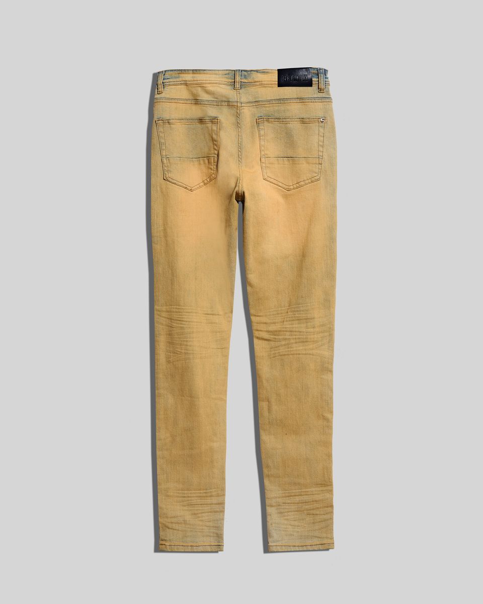 Tinted ripped jeans in a vintage blue color