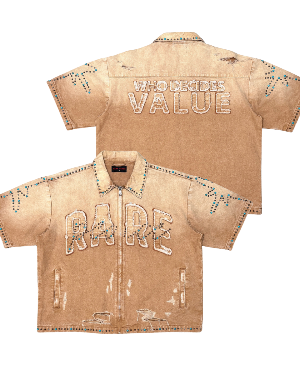Beige denim shirt with 'WHO DECIDES VALUE' and 'RARE' text on a white background