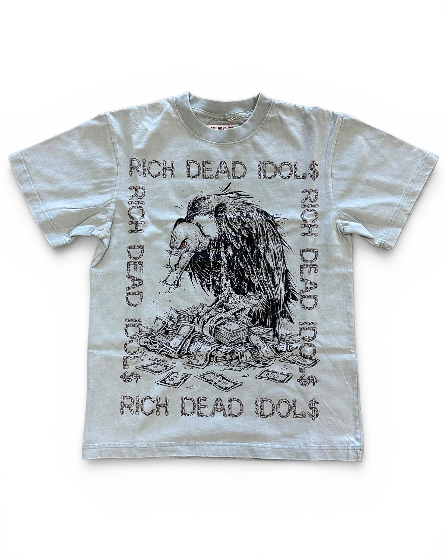T-shirt with graphic design and text 'Rich Dead Idols' on a white background