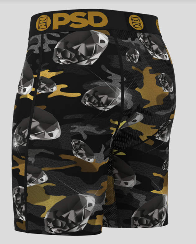 Black and gold camouflage patterned underwear with 'PSD' branding on a gray background