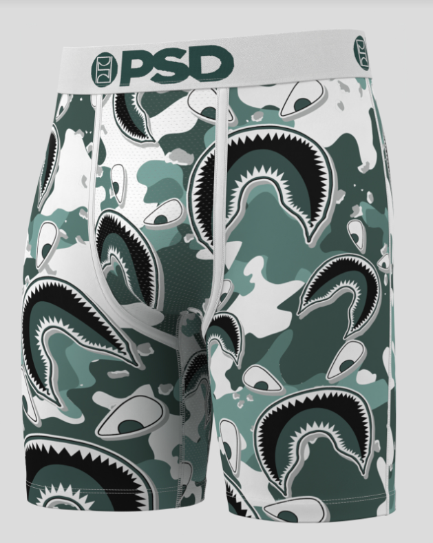 briefs with shark pattern and 'PSD' branding on a gray background