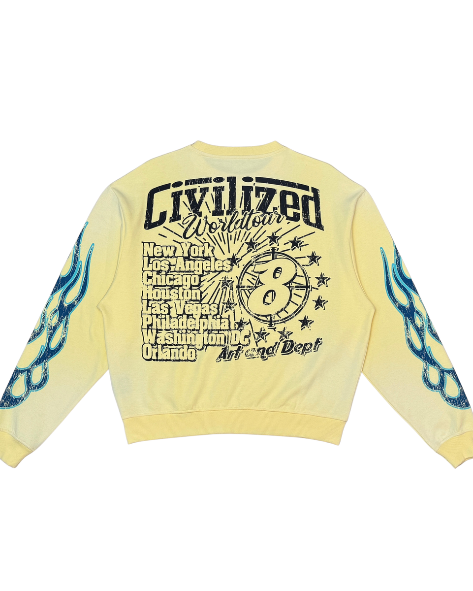 Yellow sweatshirt with black text and blue designs on sleeves against a white background