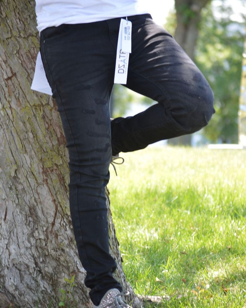 Whiskers Ripped Slim Jeans in black color