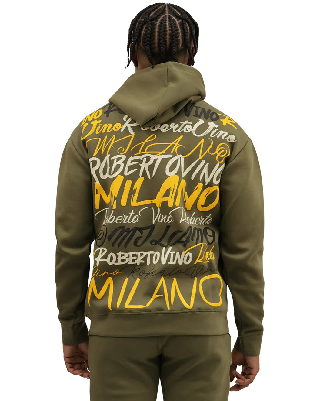 Person wearing a green hoodie with 'Milano' text on the back, on a white background