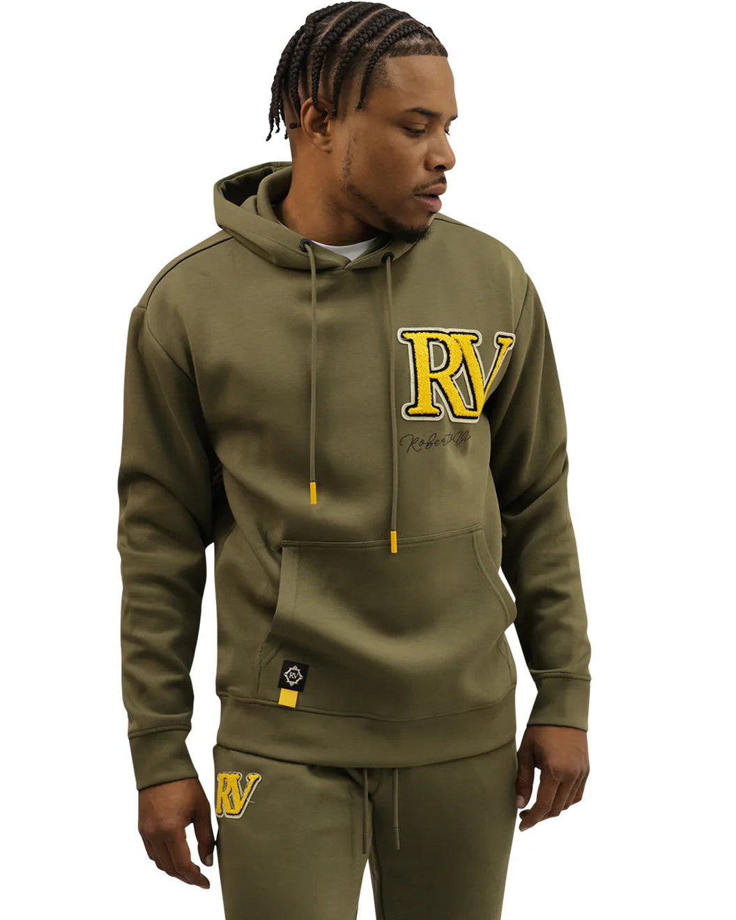 Person wearing a green hoodie and pants with 'RV' logo on a white background