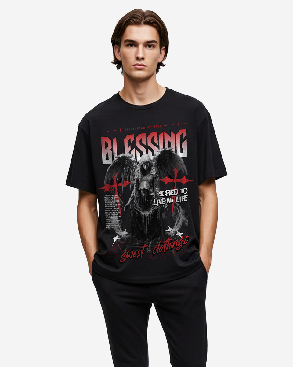 Person wearing a black t-shirt with graphic design and text on a white background