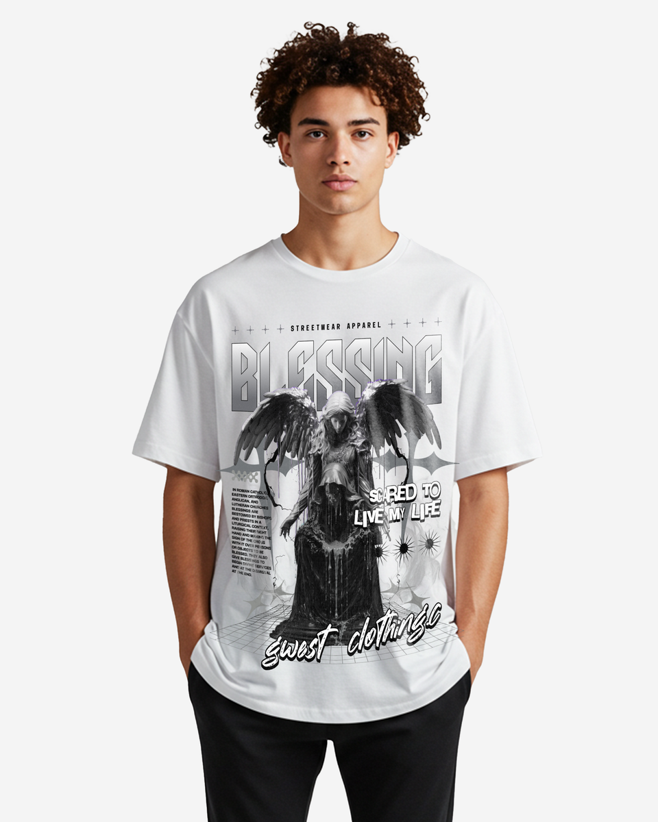 Person wearing a white t-shirt with graphic design and text on a plain background