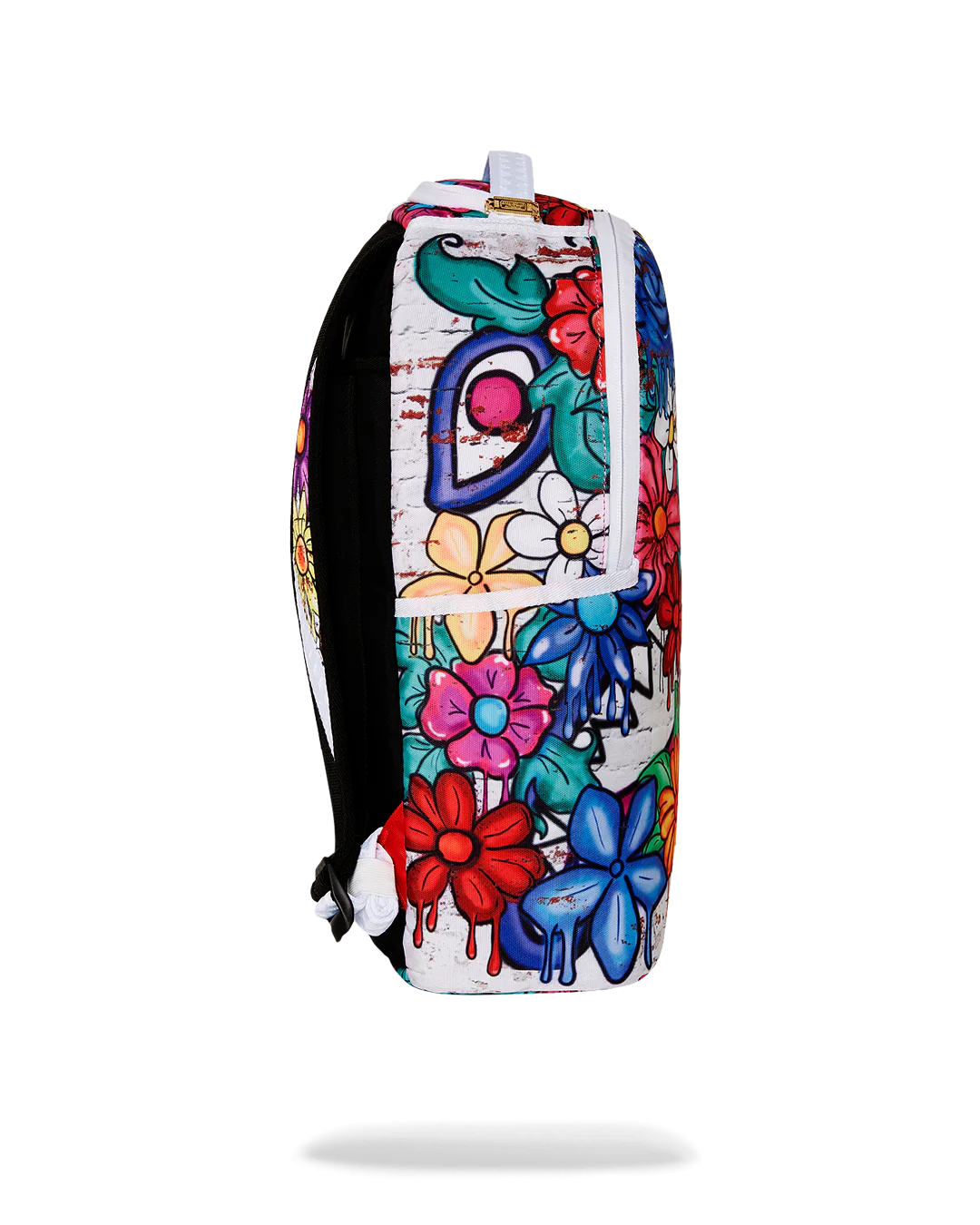 Colorful floral and graffiti-style backpack on a white background by sprayground