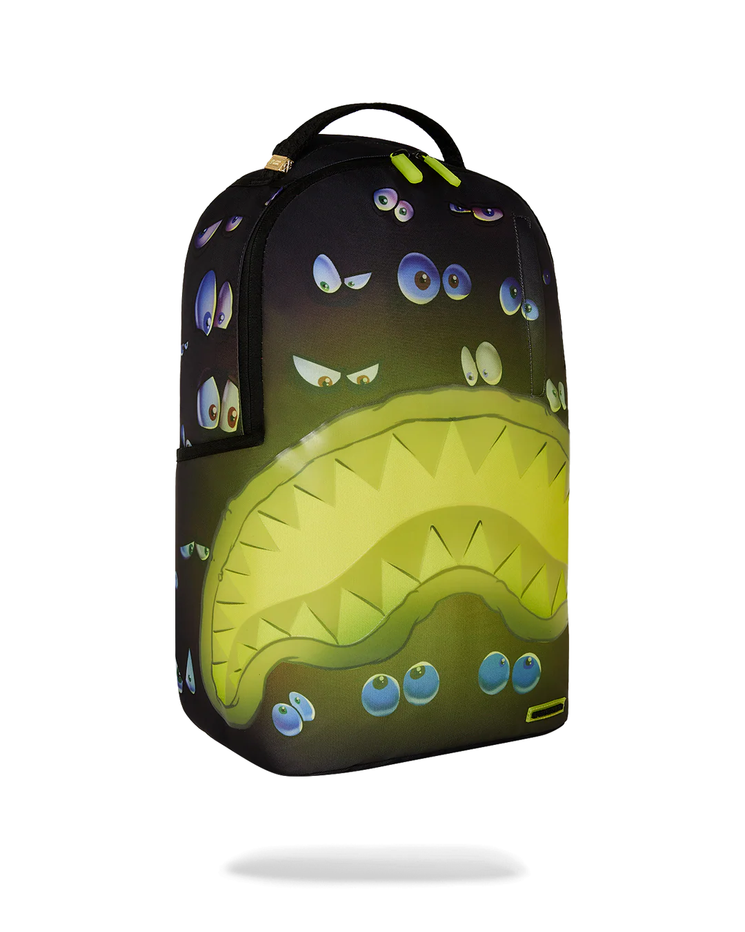 sprayground backpack with pairs of eyes all over and a neon yellow shark mouth design