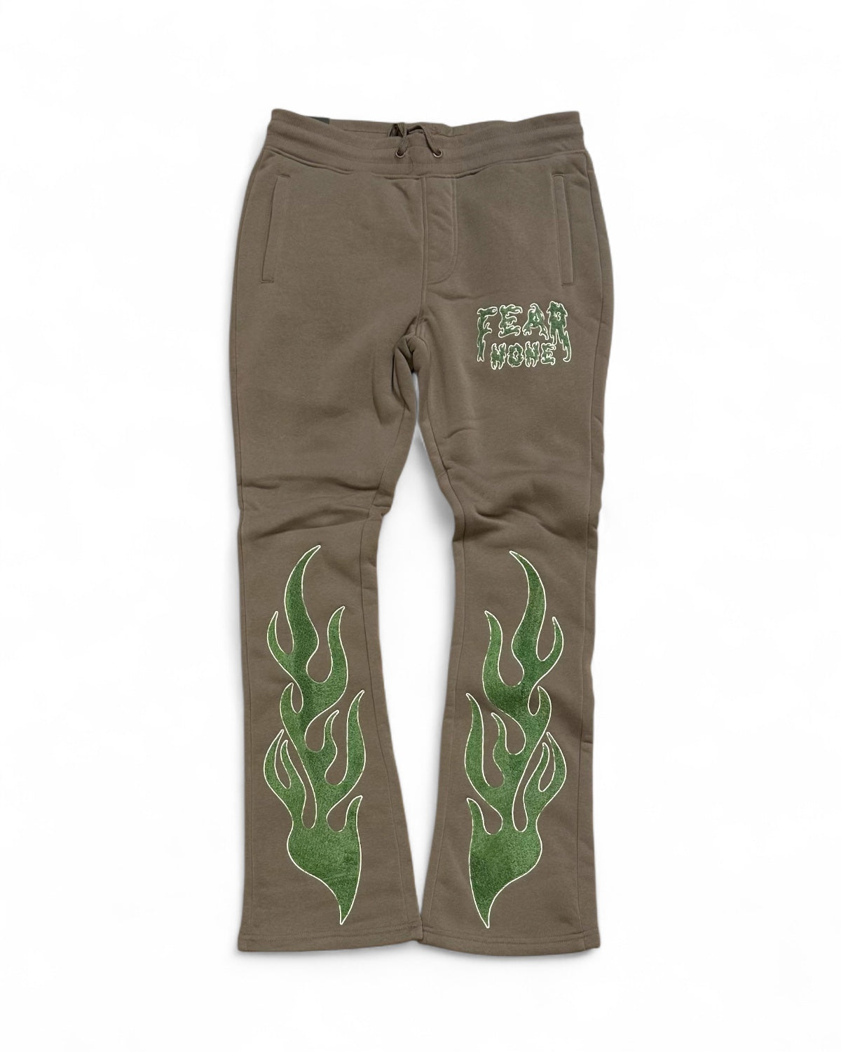 Brown pants with green flame designs on a white background