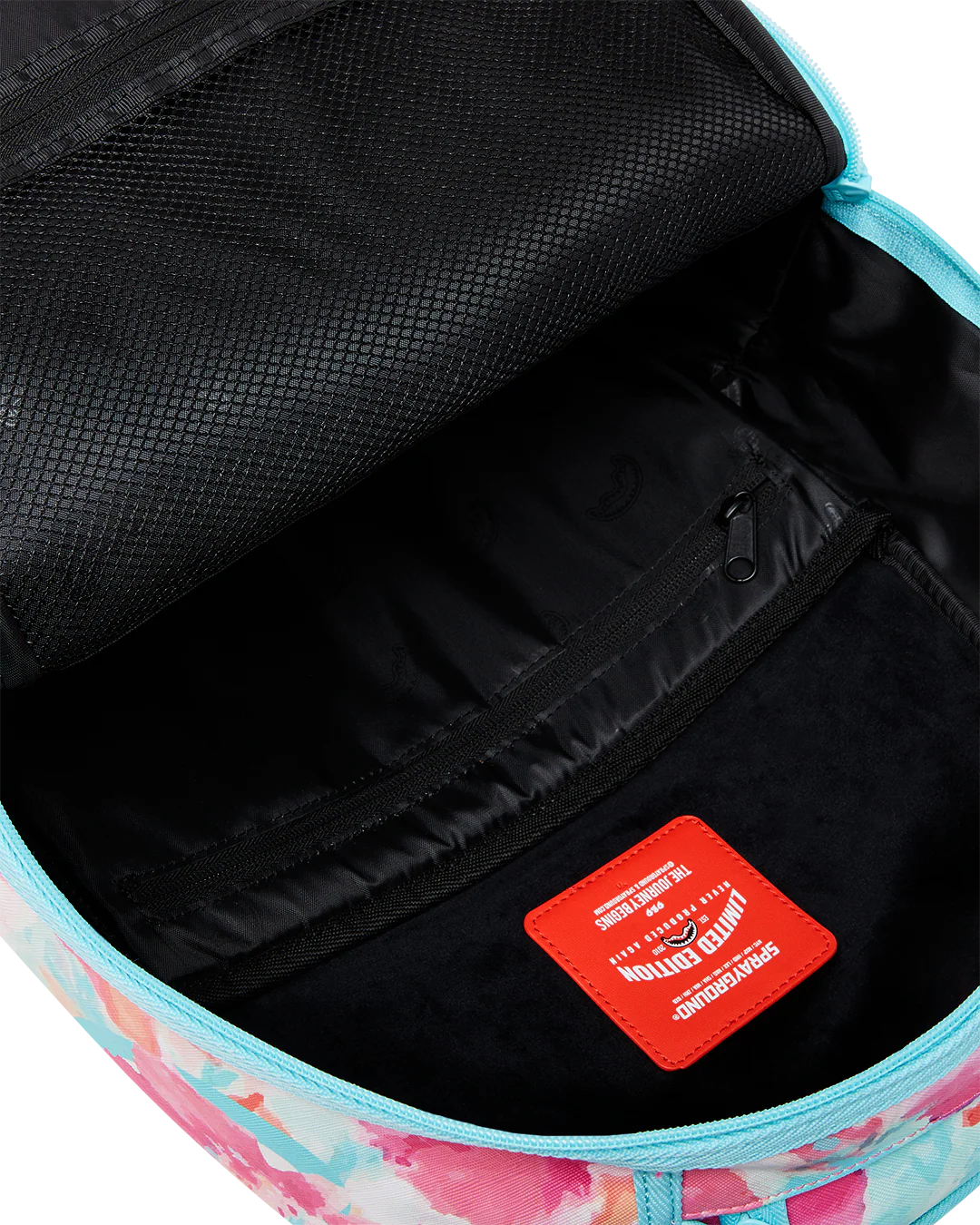 black Backpack interior with floral pattern and red label