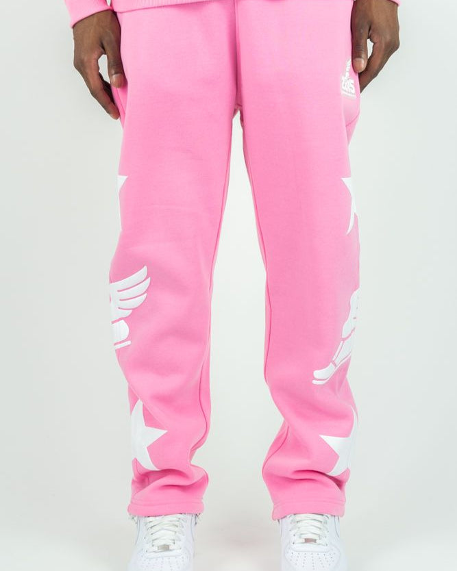 Pink sweatpants with white star designs on a white background