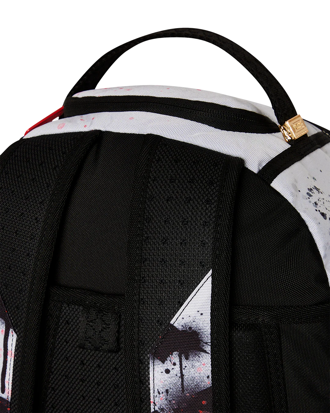 Close-up of a backpack with a black strap and white design on a white background
