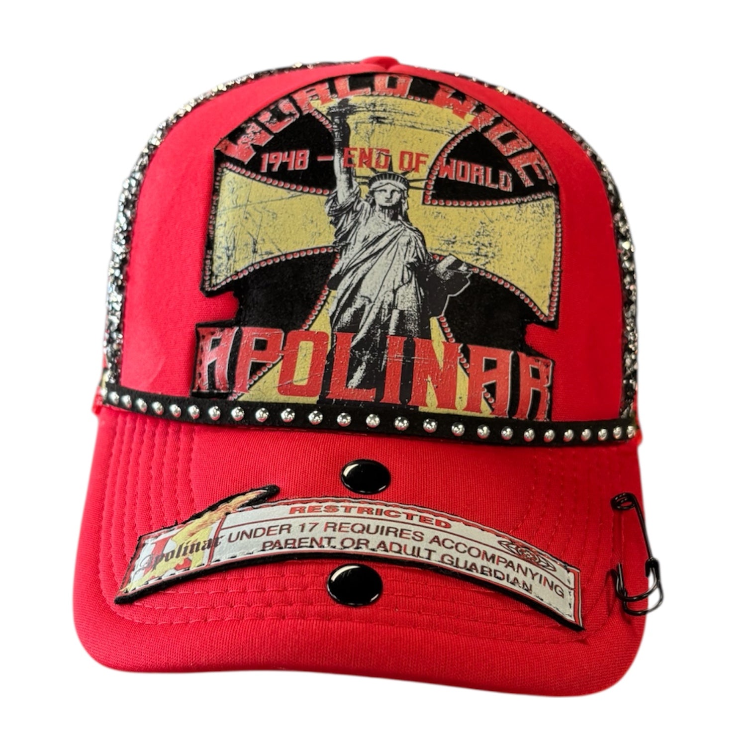 Red cap with graphic design featuring a statue of liberty and text on a white background
