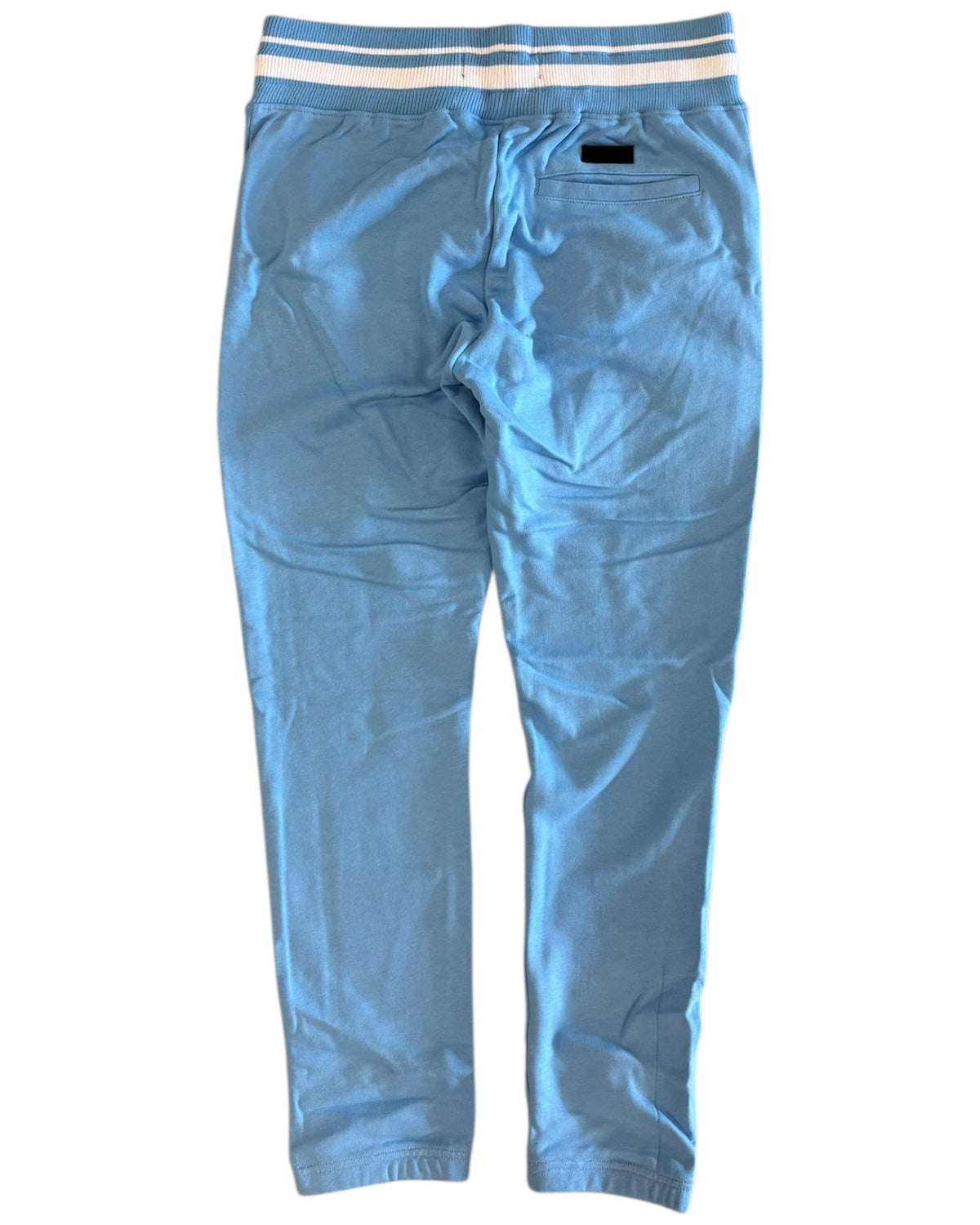 Light blue pants with a white waistband on a white background