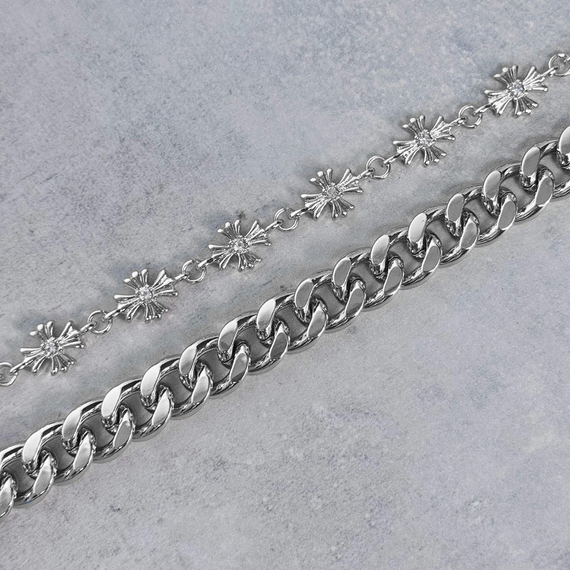 silver chain on a gray surface