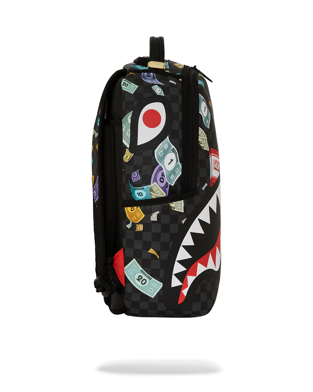 Backpack with colorful shark design on a checkered background