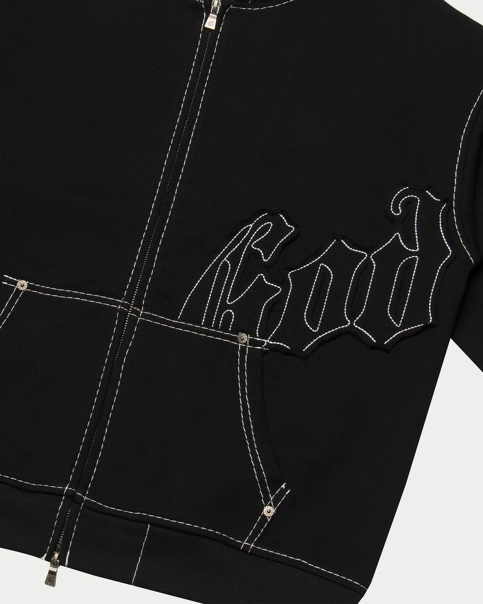 Black jacket with white embroidered design on a white background