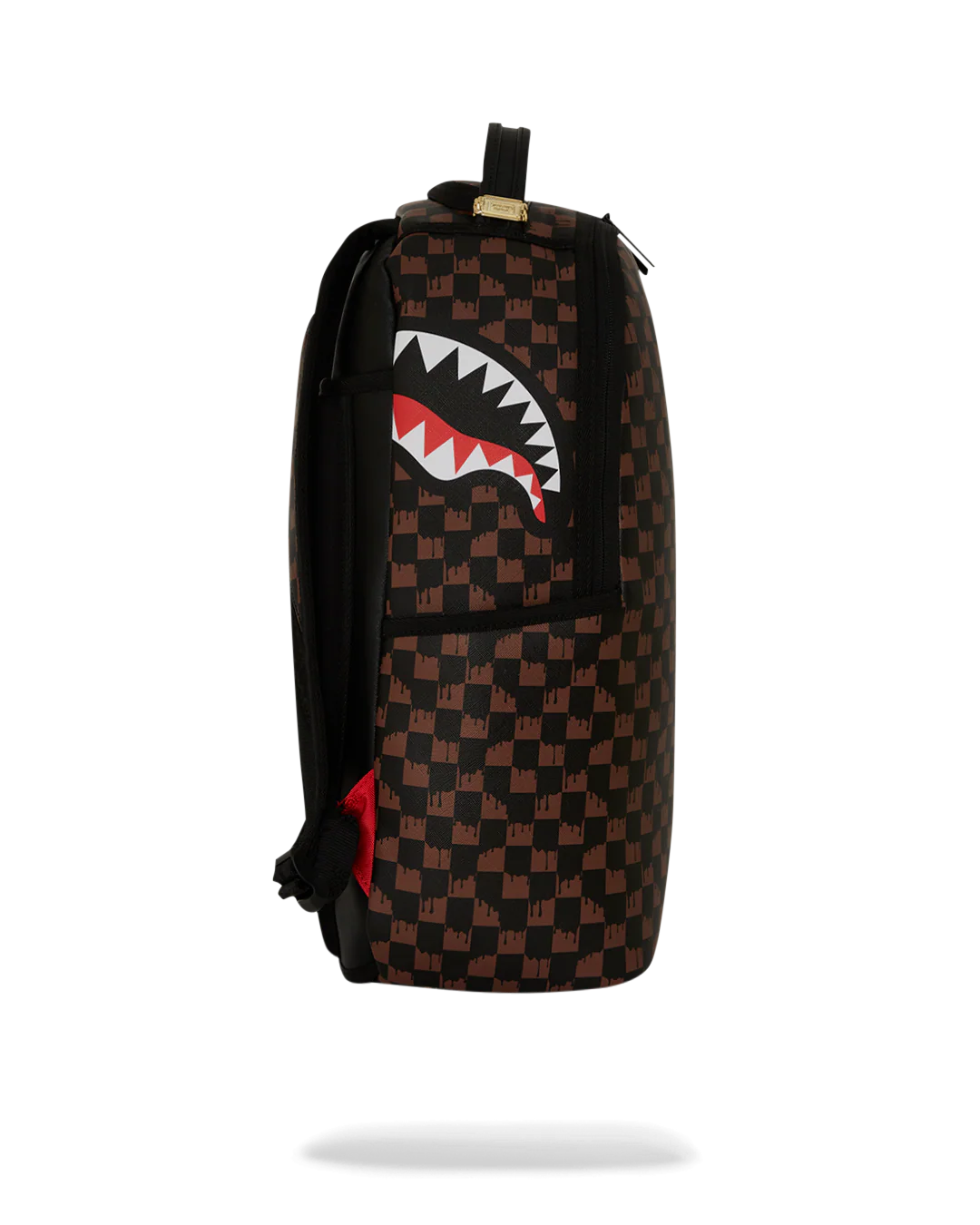 Checkered backpack with a shark mouth design on a white background by the brand Sprayground