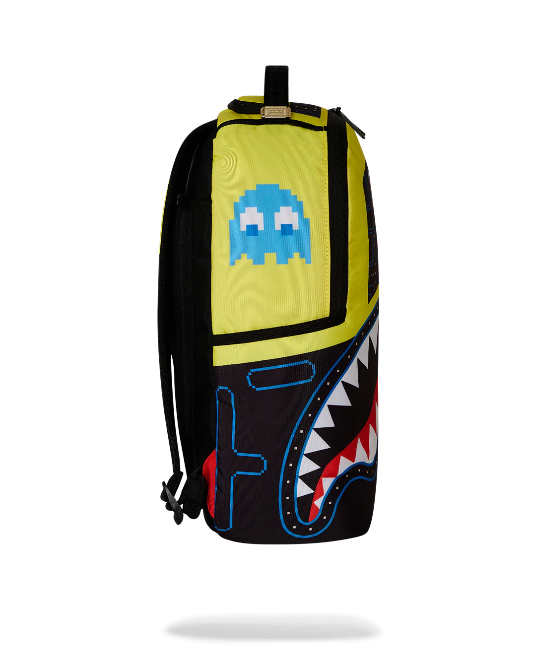 Pac-Man themed sprayground backpack with colorful design on a white background