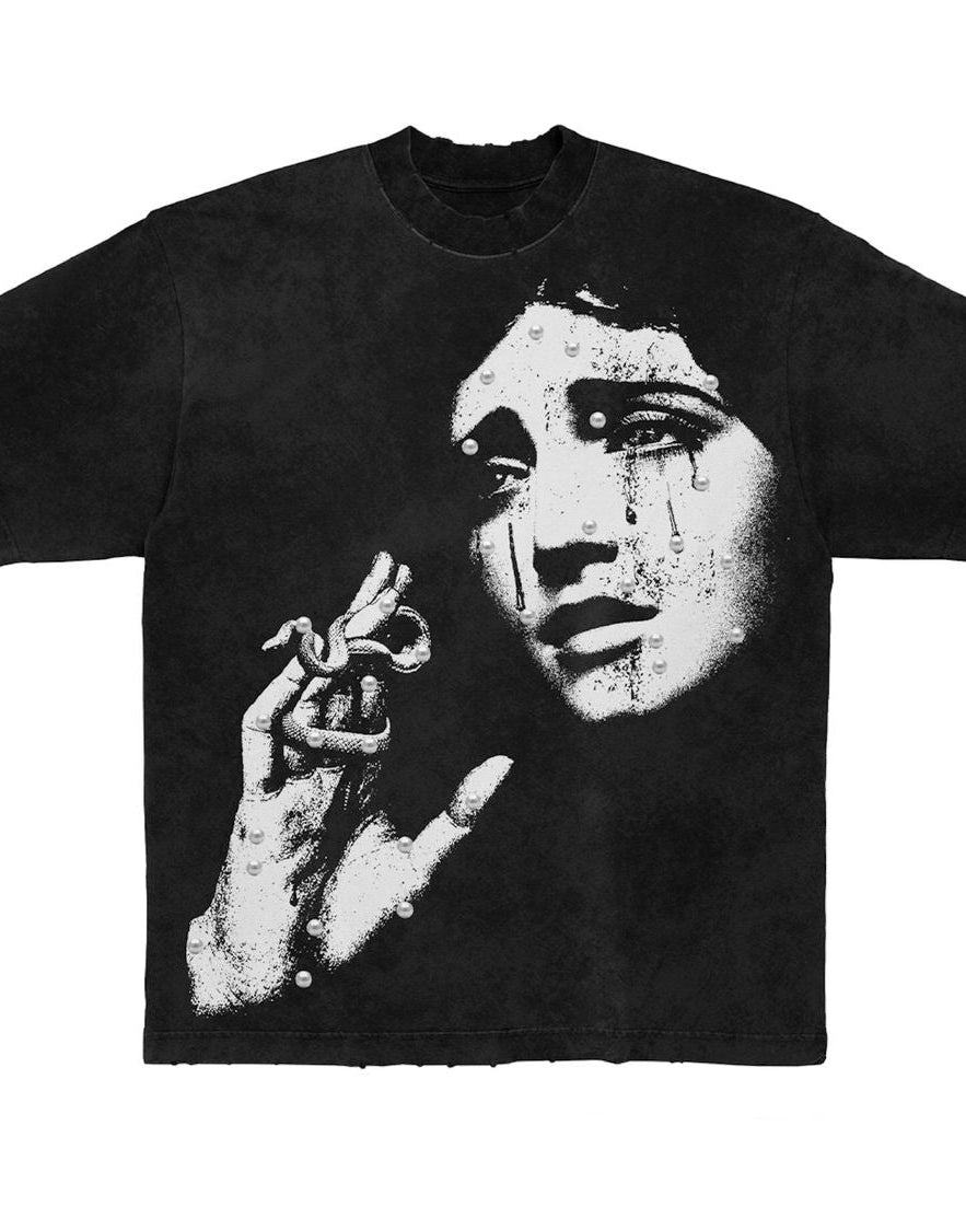 Black t-shirt with a graphic design of a woman's crying face and hand on a white background