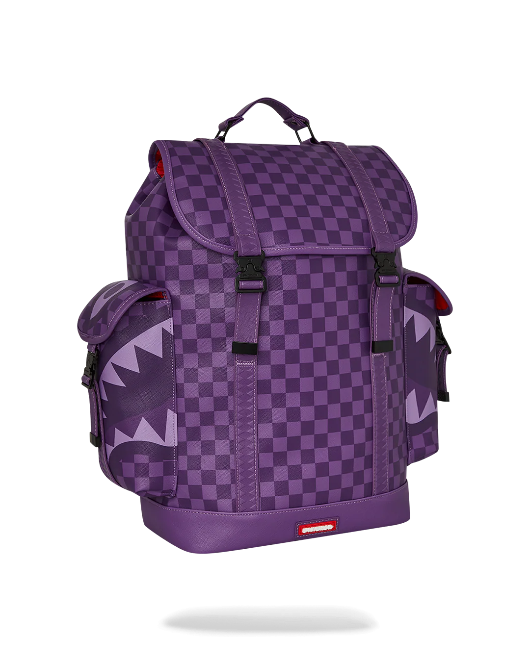 all systems go monte carlo spraygroung backpack with checker board pattern adn shark mouth design in purple