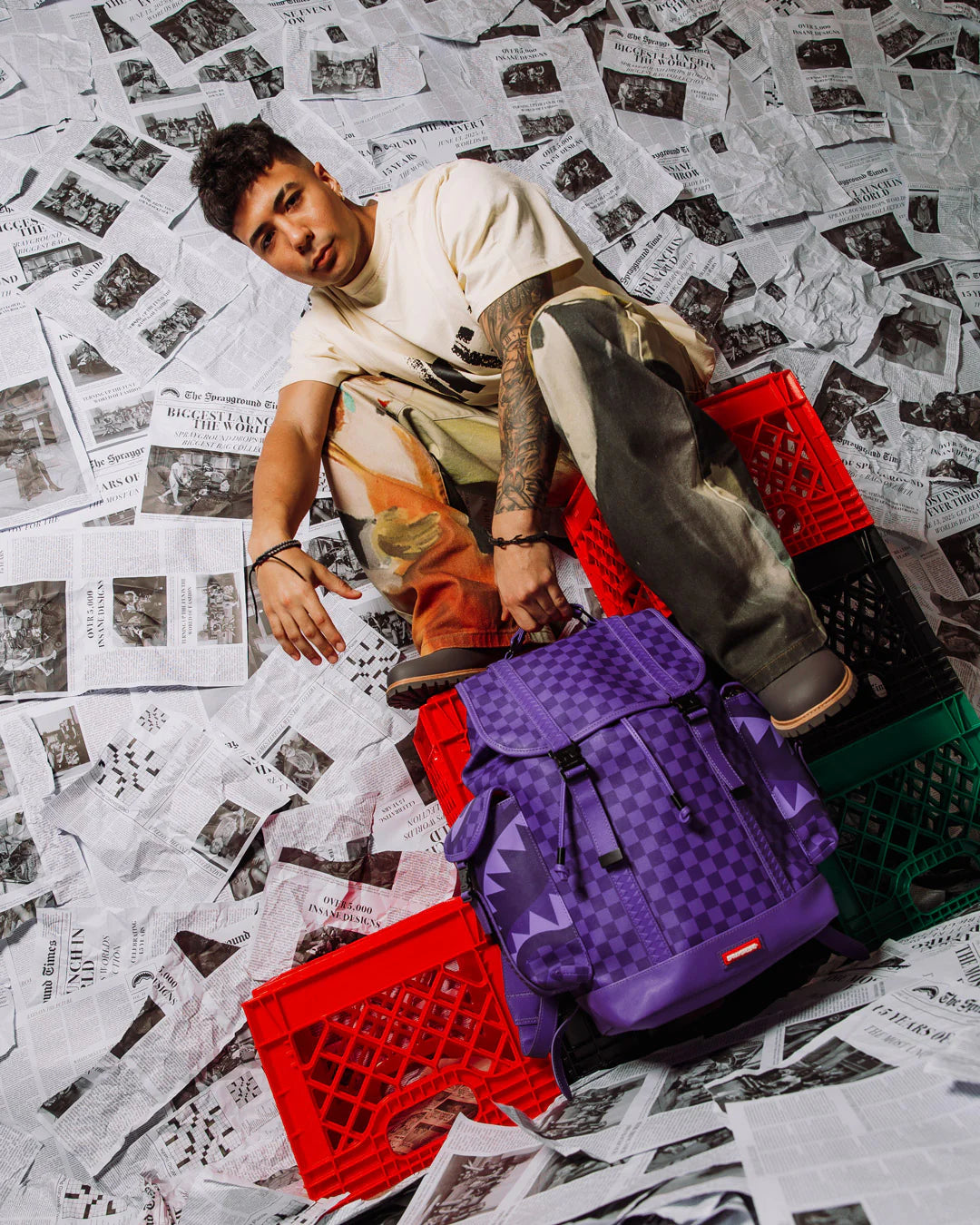 all systems go monte carlo spraygroung backpack with checker board pattern adn shark mouth design in purple
