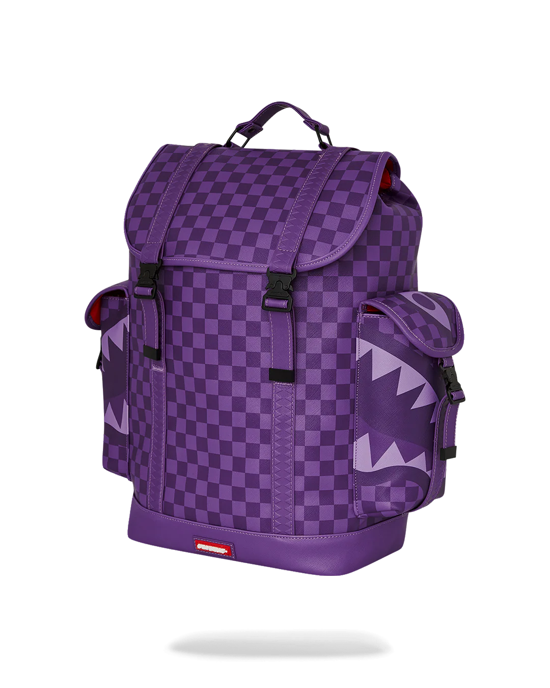all systems go monte carlo spraygroung backpack with checker board pattern adn shark mouth design in purple