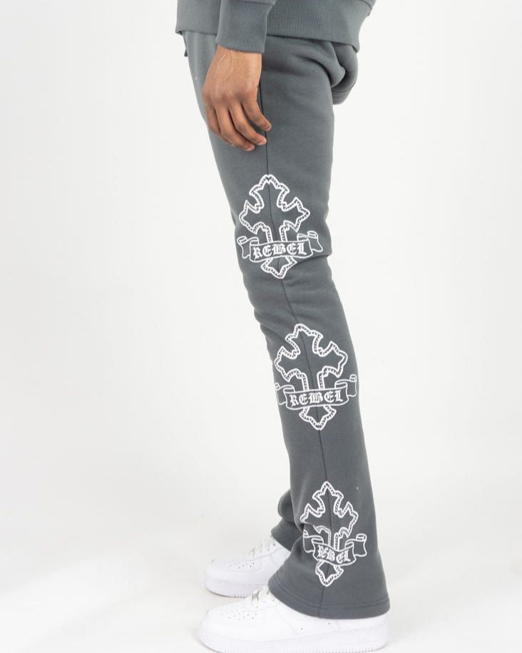 Gray sweatpants with white 'Rebel' logo on a white background