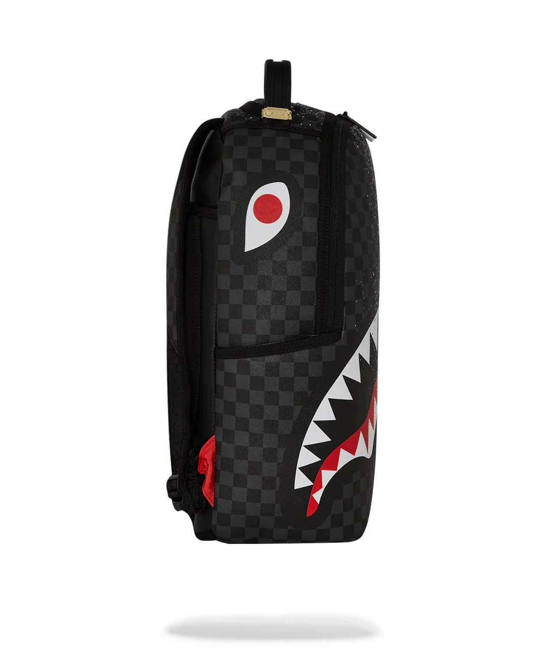 Backpack with checkered pattern and shark mouth design on a white background by the brand sprayground
