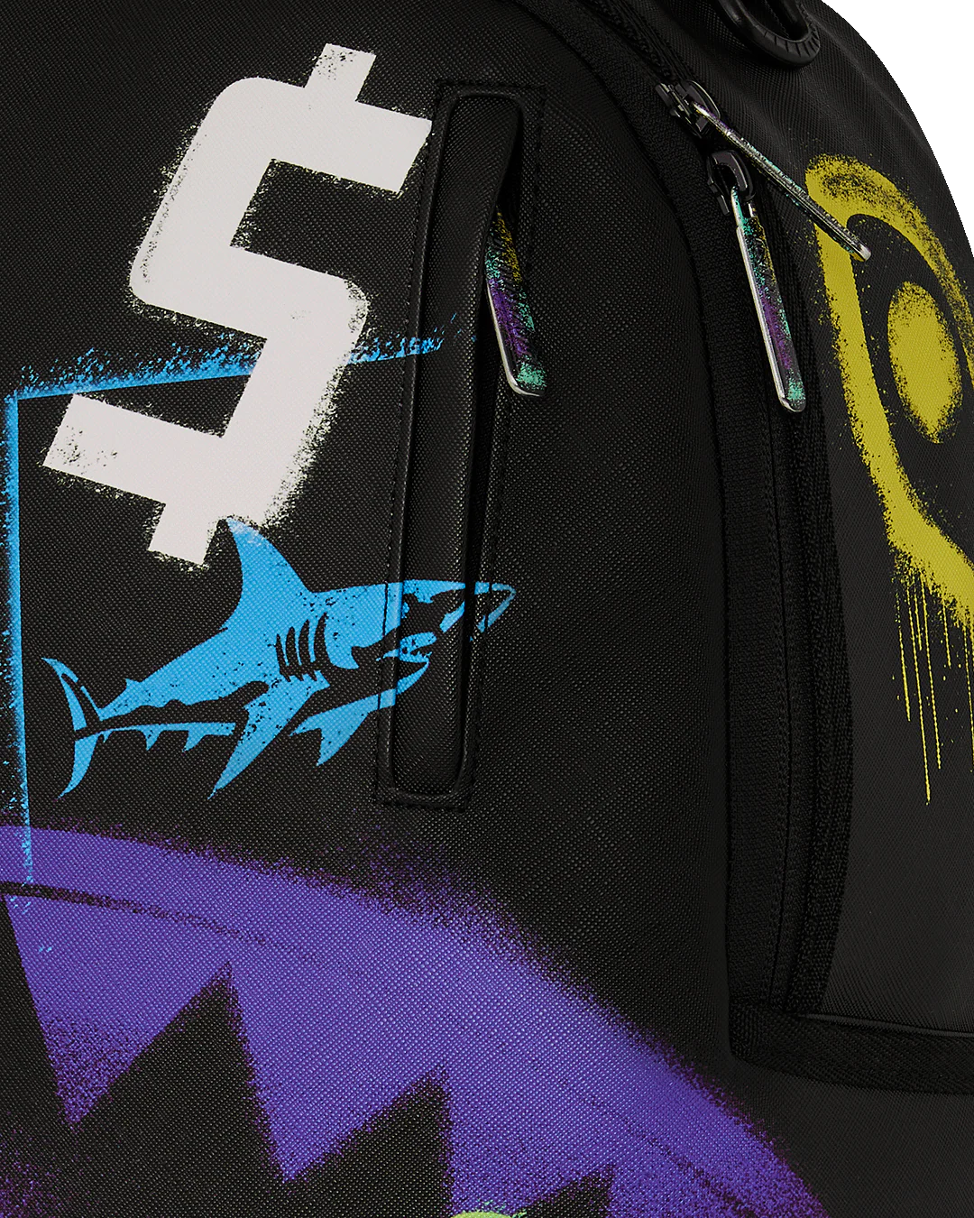 Backpack with colorful graffiti-style graphics and brand logos on a white background by the brand sprayground