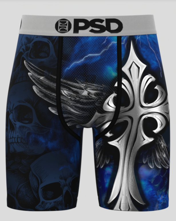 Boxer briefs with skull, cross, and wing design on a blue and black background.