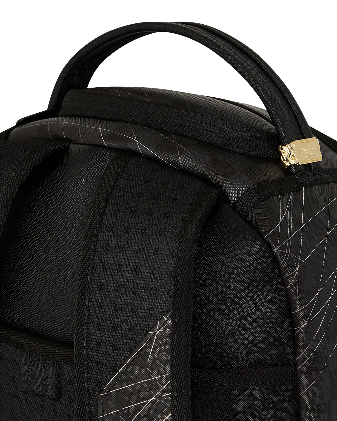 Close-up of a black backpack with geometric pattern on a white background