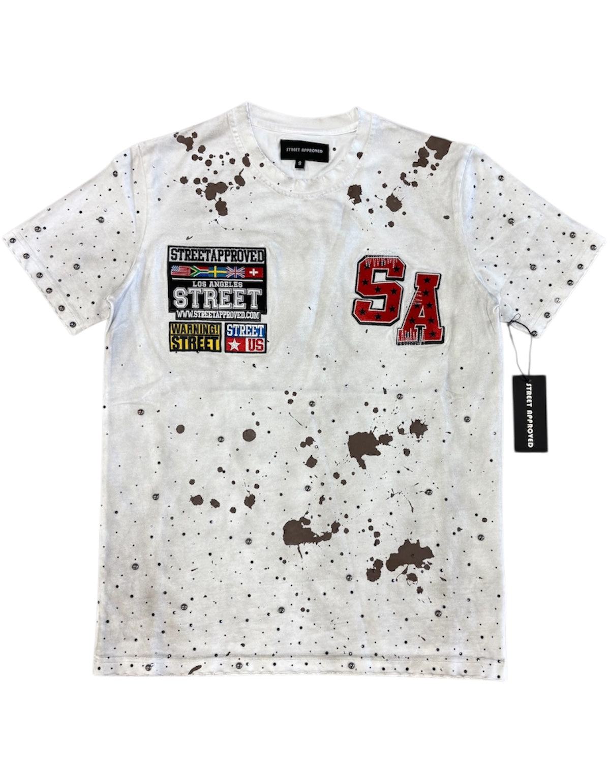 White t-shirt with brown splatter design and visible branding on a white background