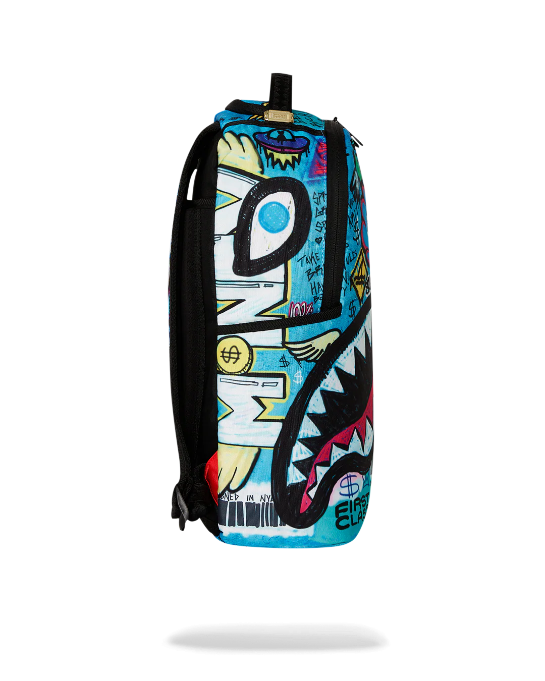 Colorful sprayground backpack with shark design and graffiti-style text on a white background
